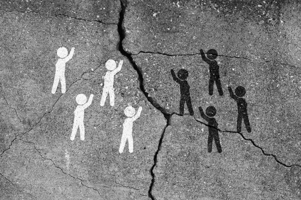 Whites and blacks are bickering and there are cracks between them.